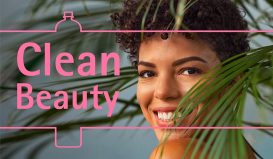 Young woman behind palm plant with Clean Beauty Overlay